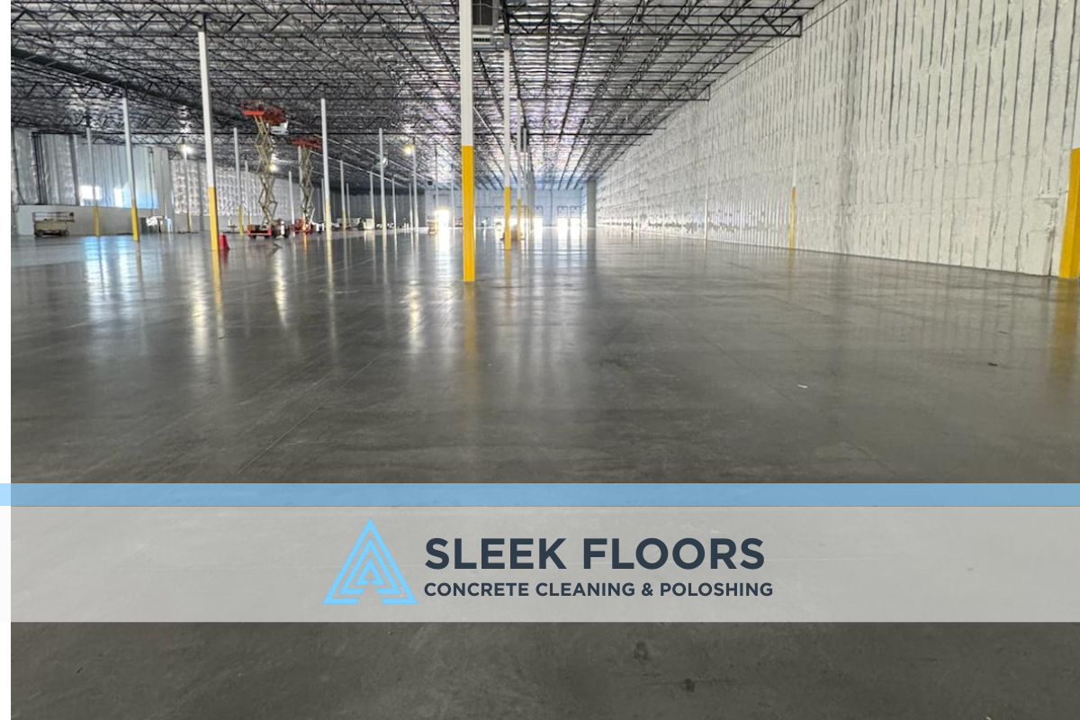 Wide view of sealed concrete warehouse floor with polished finish